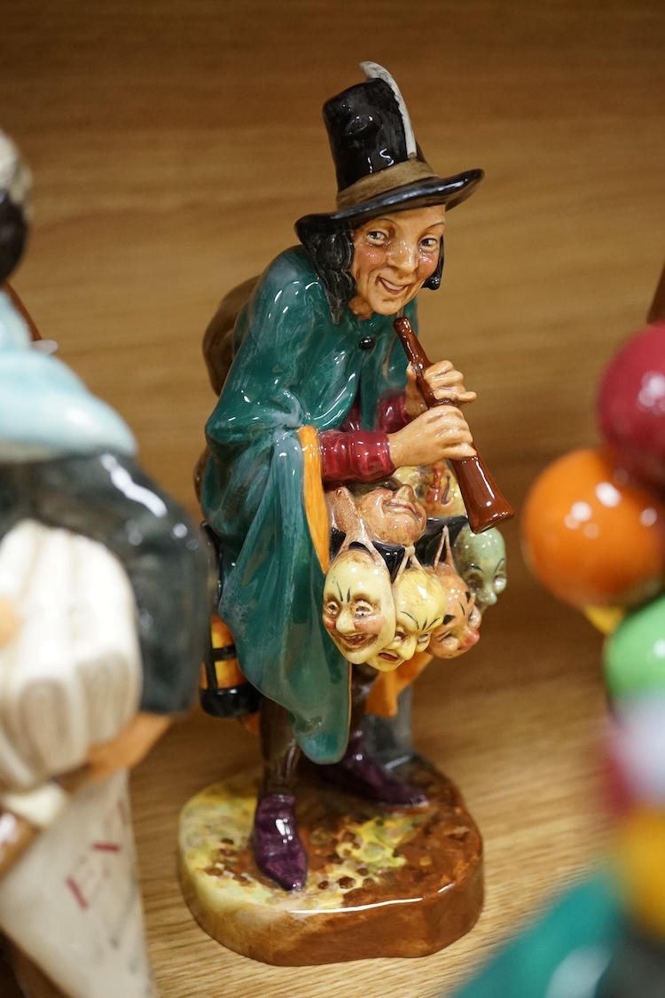 A collection of Royal Doulton figures to include The Old Balloon Seller, Doctor, Votes for Women and The Detective